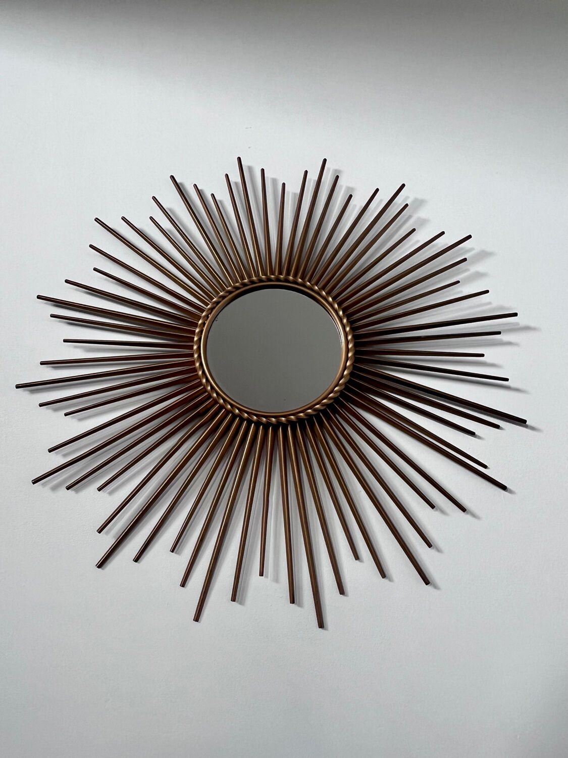 Old sun mirror in gold metal design from the 60s Chaty Vallauris