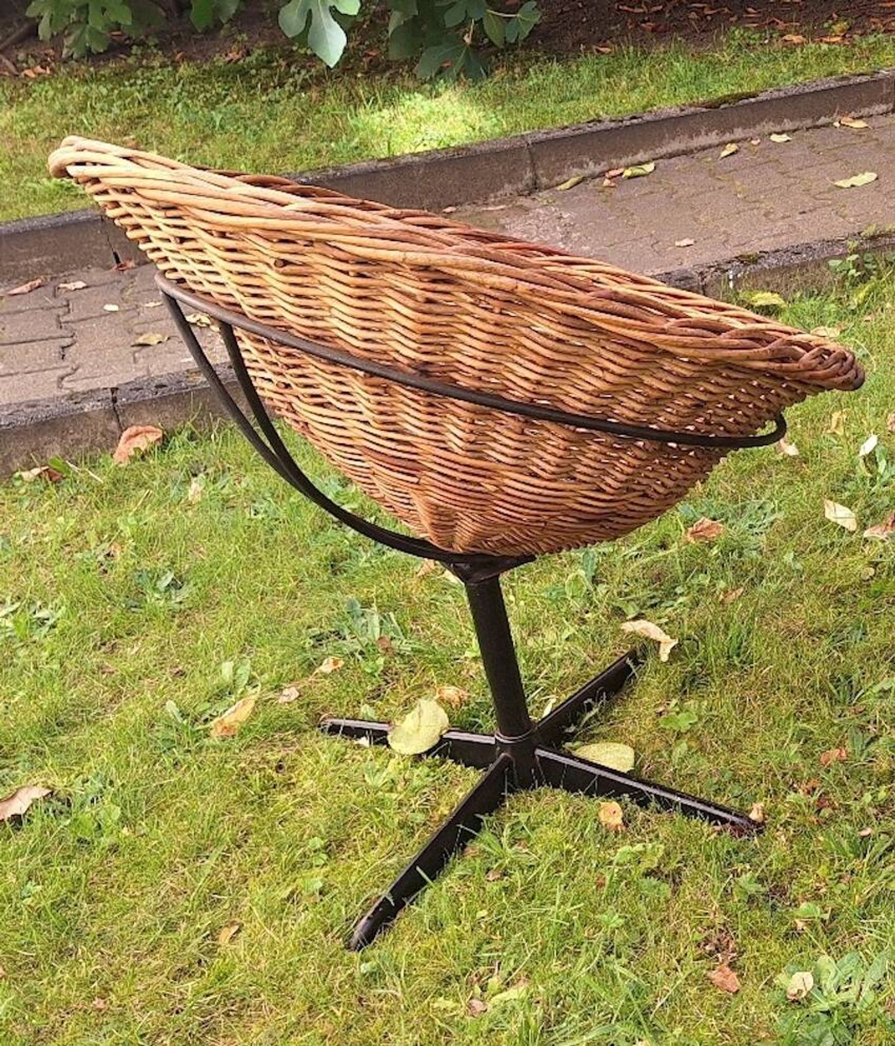 Rattan and iron swivel pod chair, 1960s