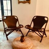 Pair of leather and bamboo armchairs