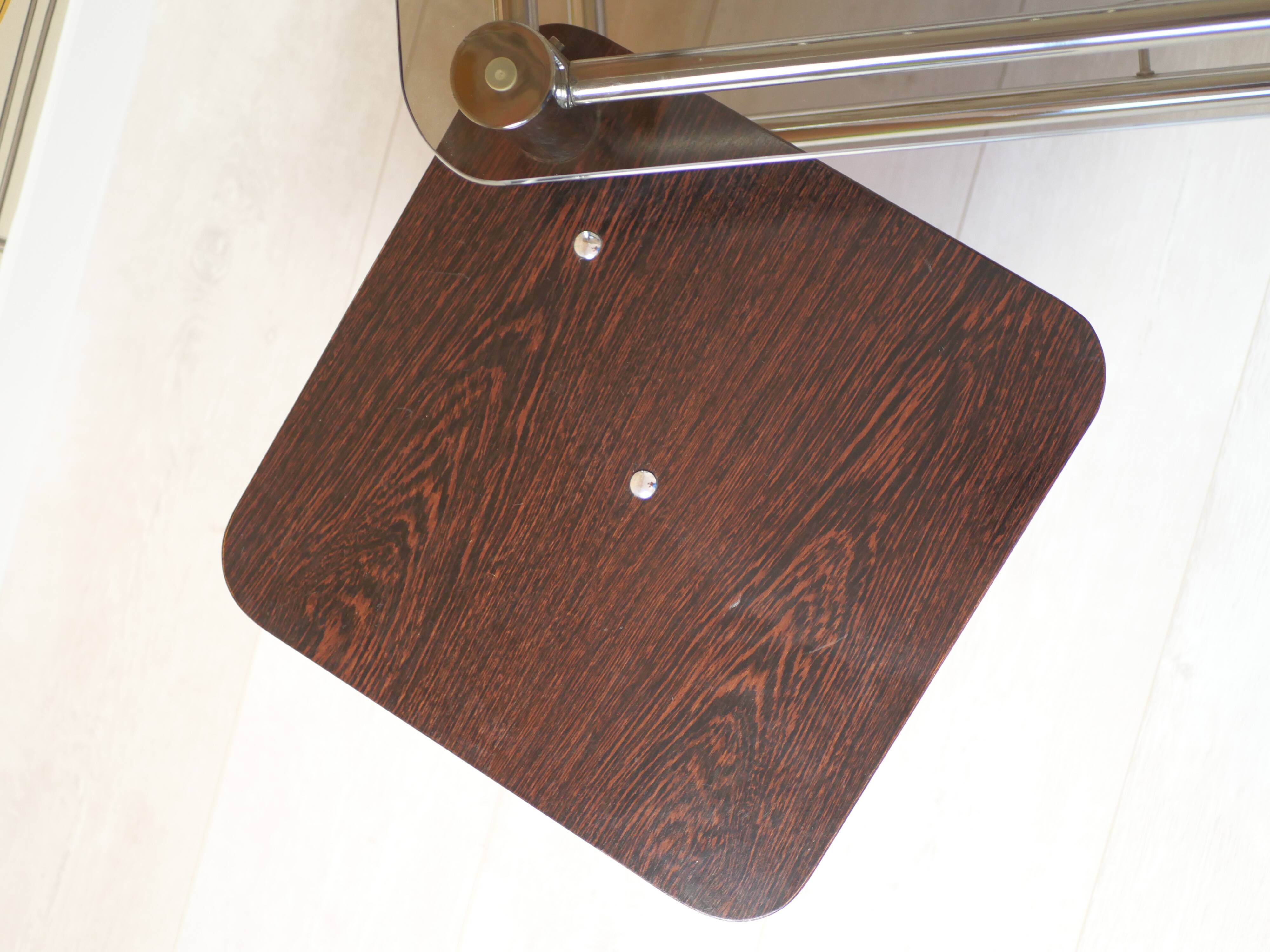 Chrome metal coffee table with smoked glass top.