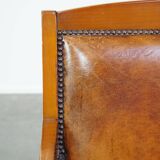 Sheep leather Art Deco design armchair combined with wood