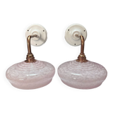 Pair of pink globe wall lights