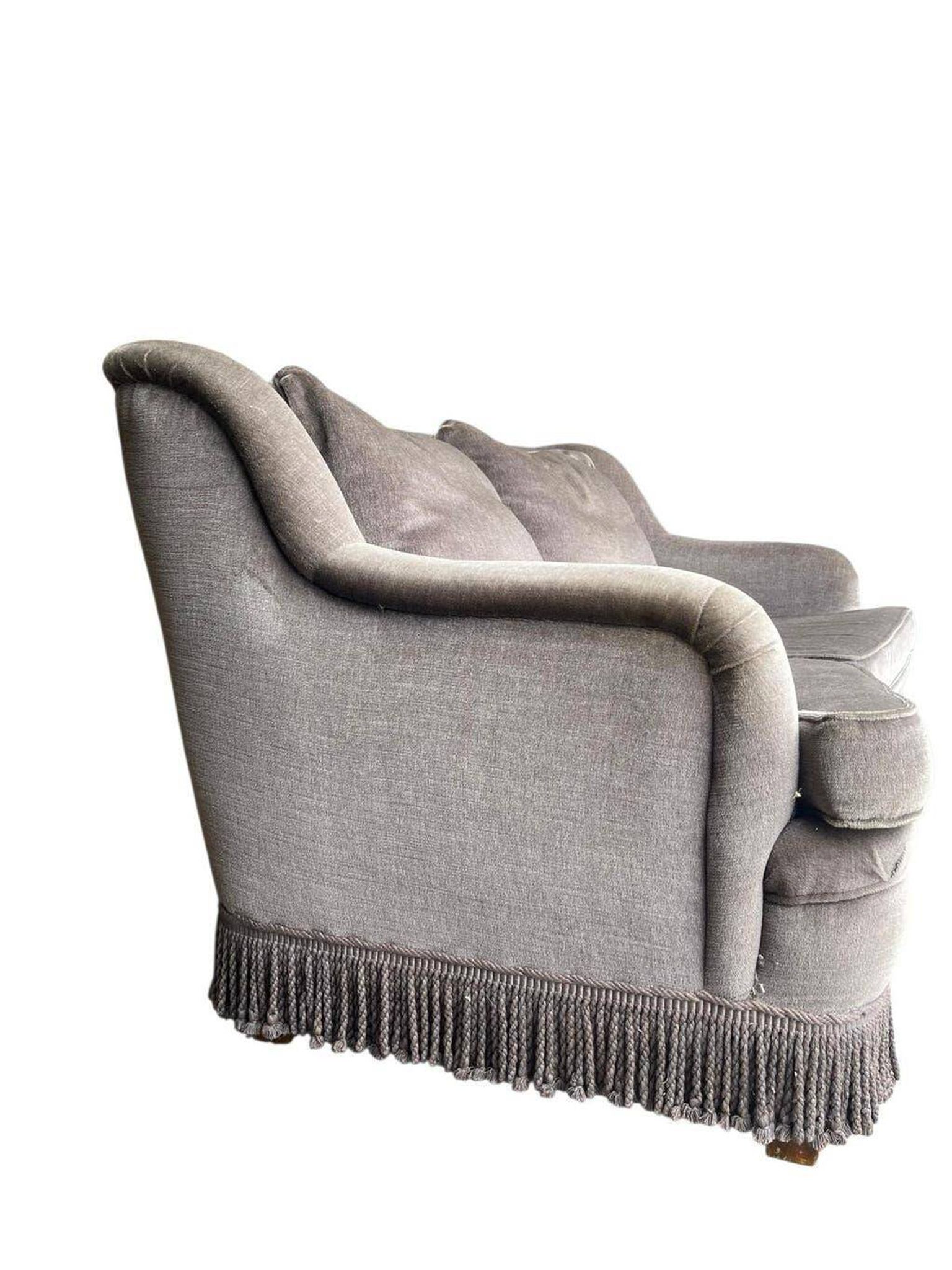 Vintage taupe two-seater armchair/sofa with fringes.