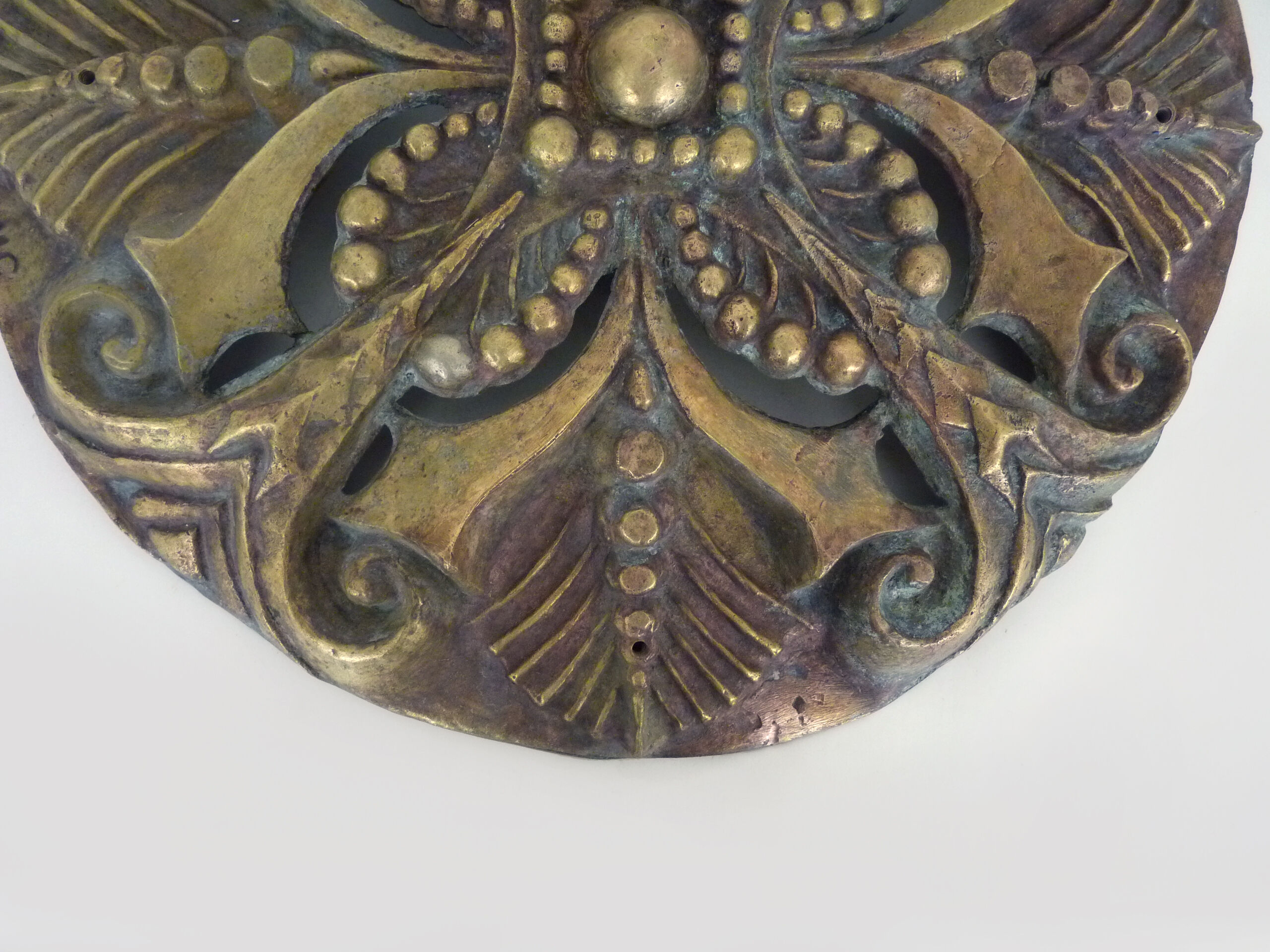 Openwork bronze wall lamp signed MC, 50s