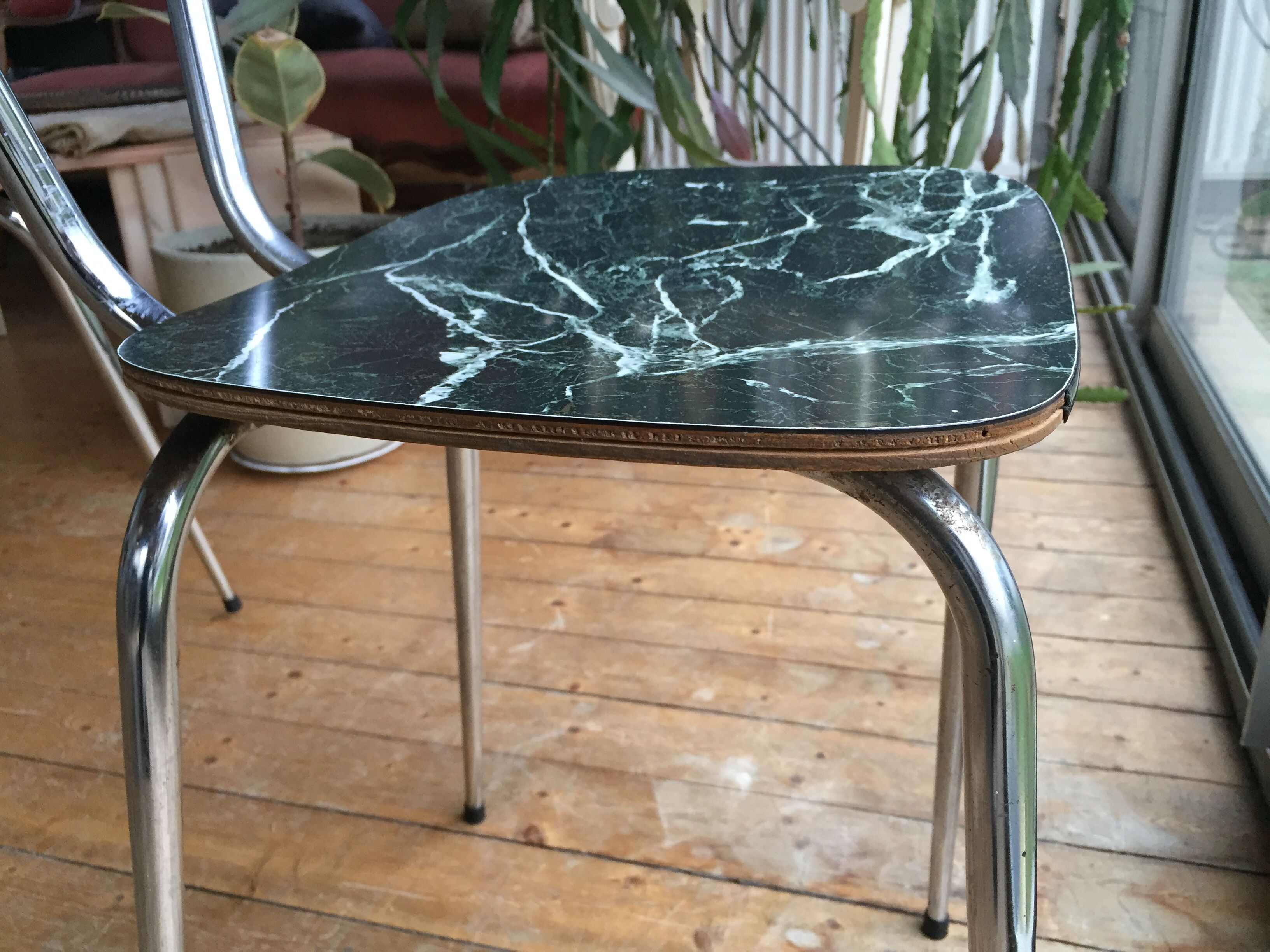 4 chairs in very dark green formica marble effect