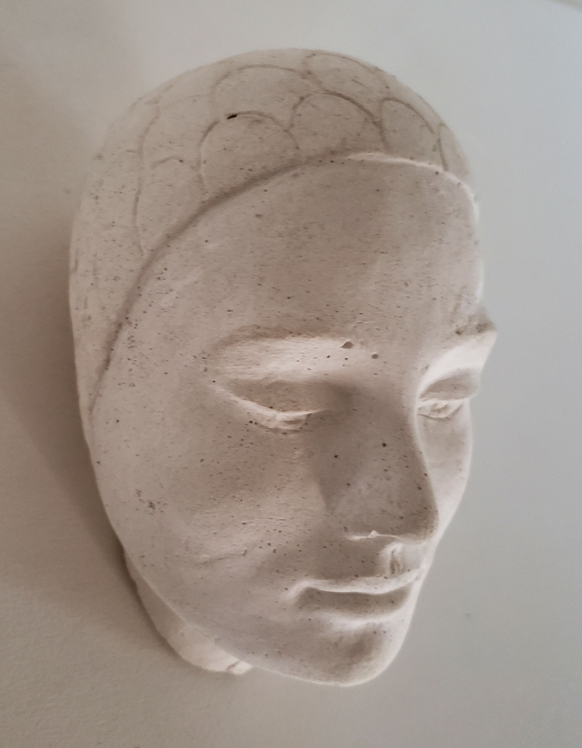 Plaster art-deco woman's head