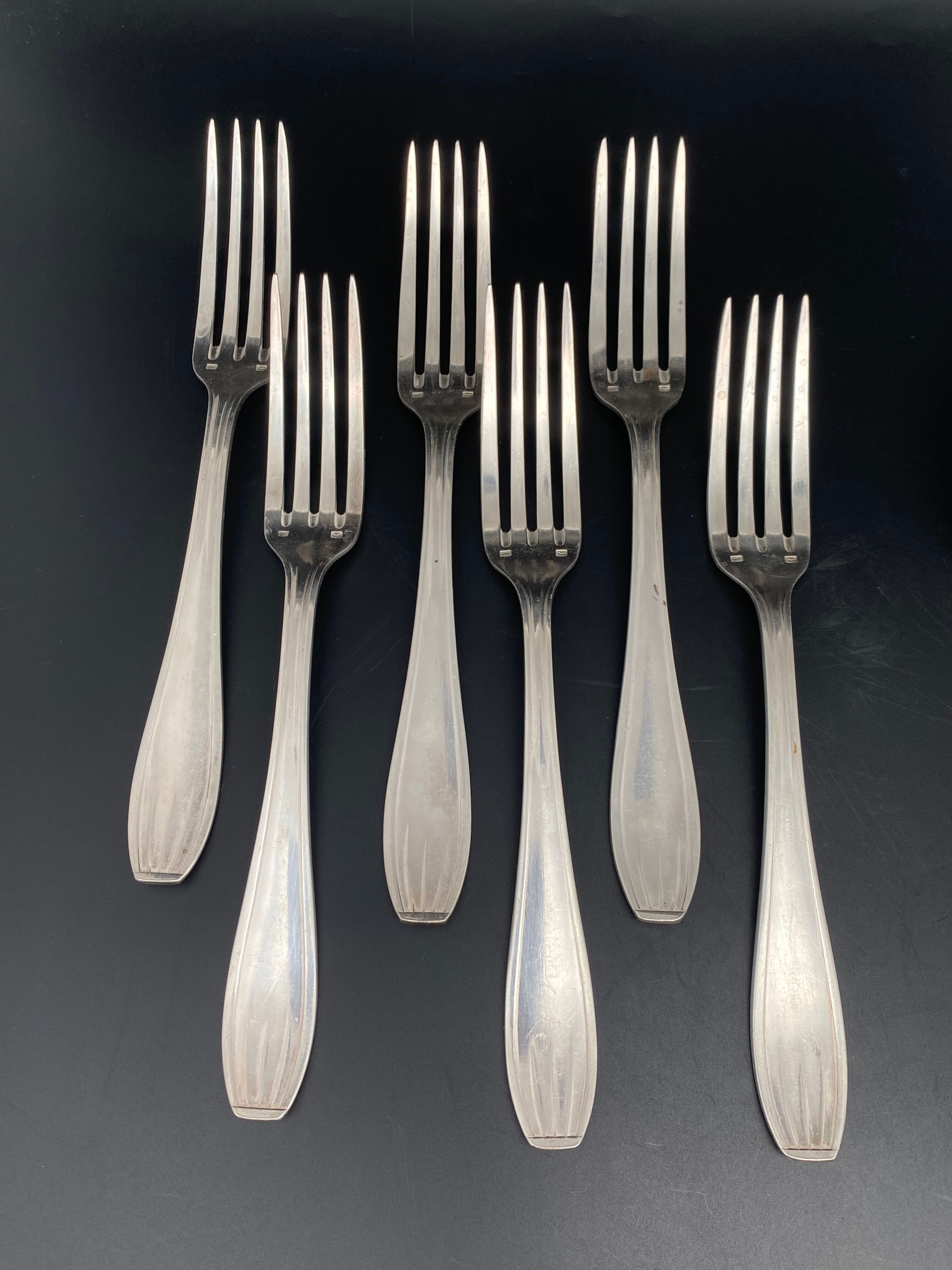 Silver metal cutlery