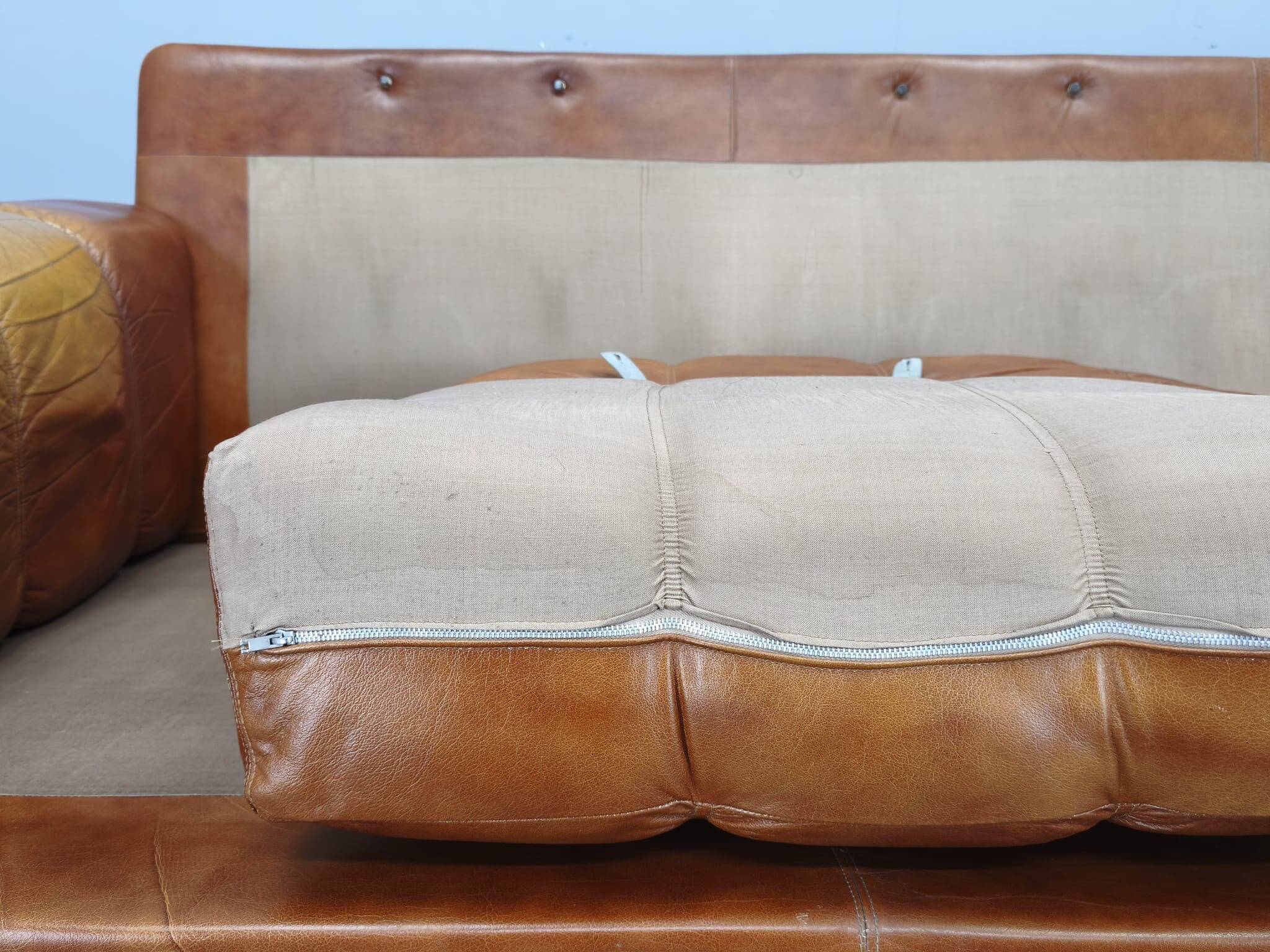 Three-seater sofa from the mid-century produced in Italy in the 1970s.