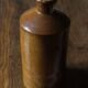 Bouteille à liqueur bec verseur grès vintage Bourne Deney
