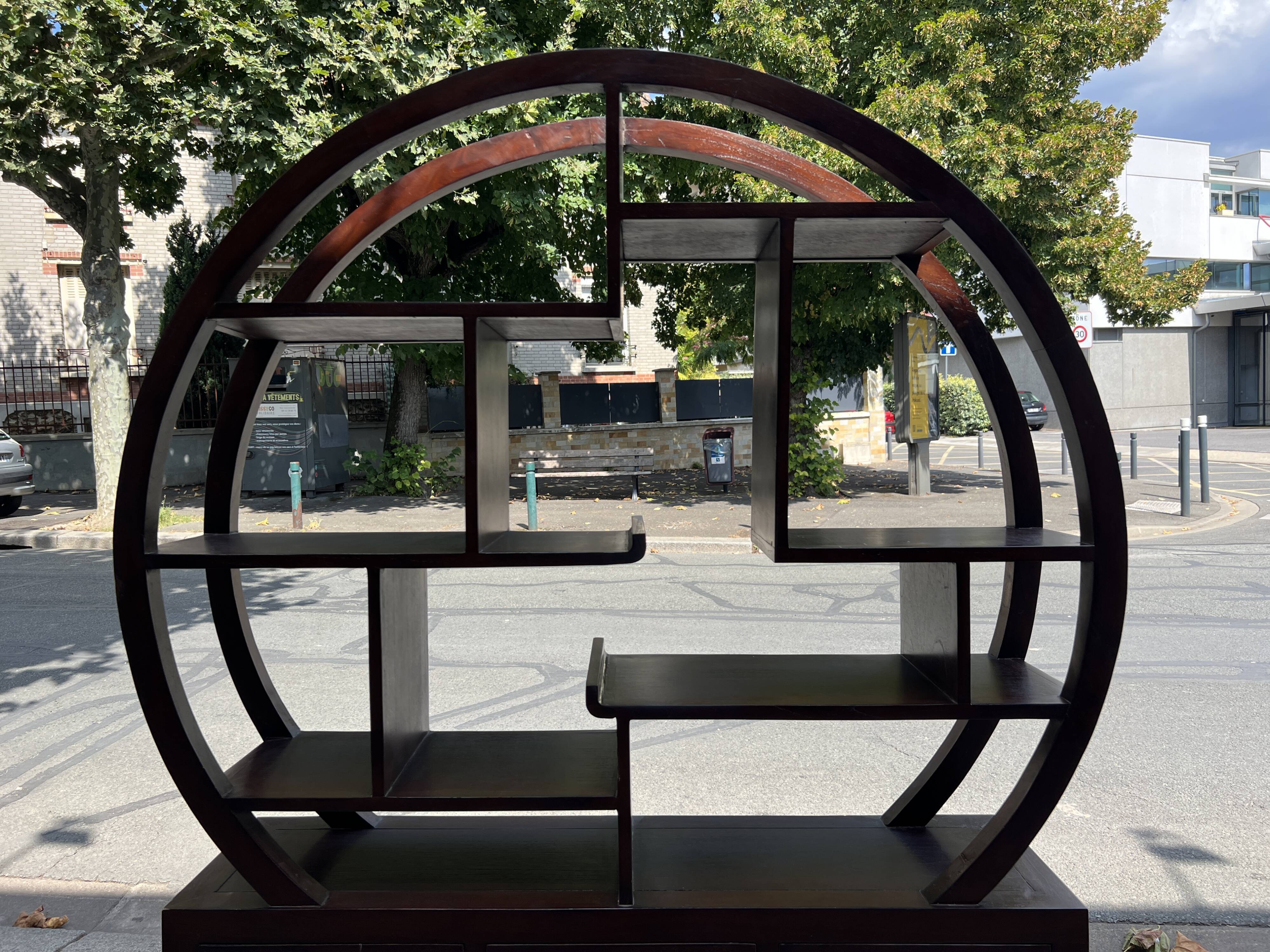 Round galay shelf on bahut sideboard