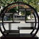 Round galay shelf on bahut sideboard