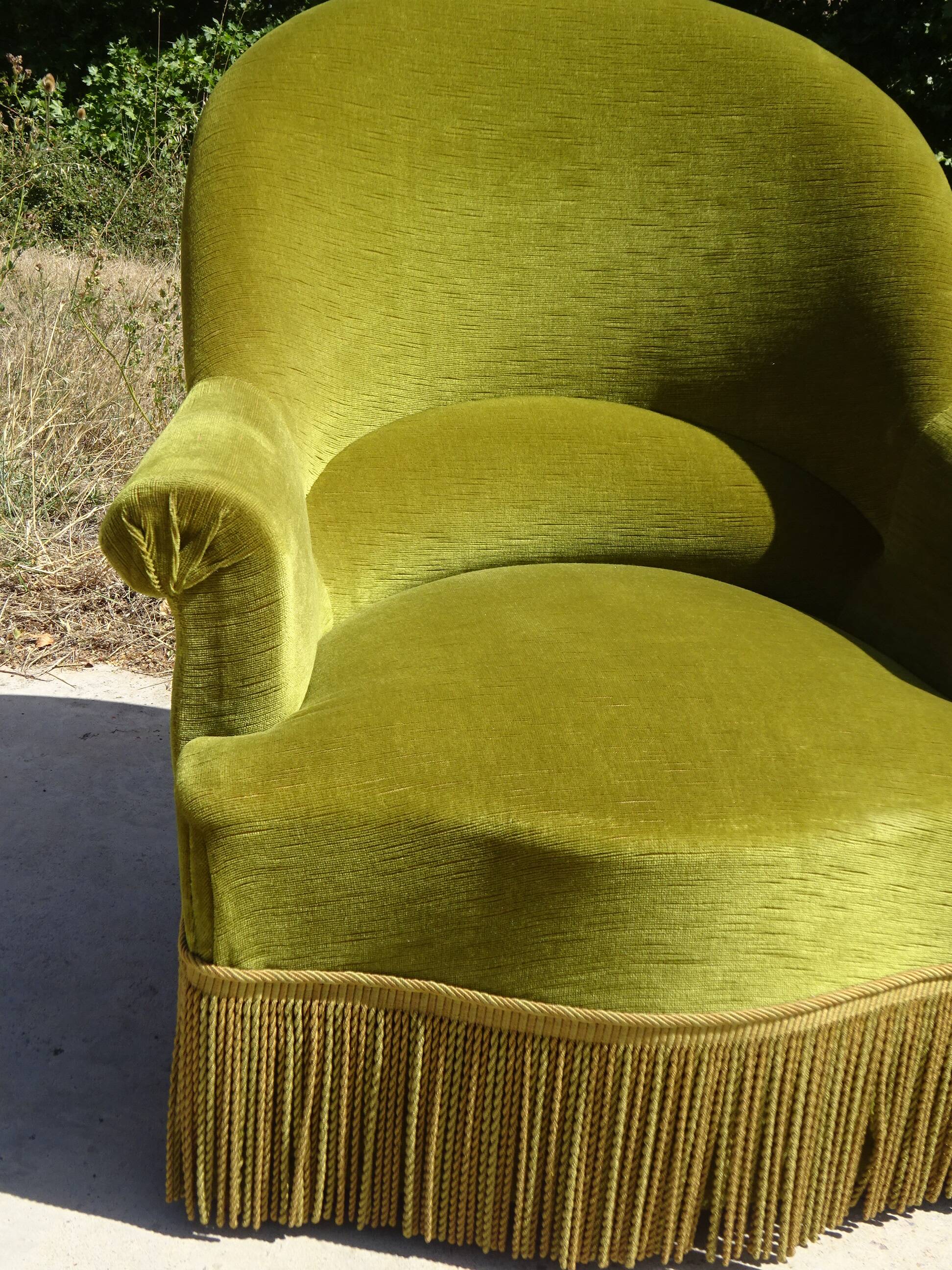 Paire de fauteuils crapauds en velours vert