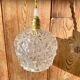 Globe pendant light in chiseled glass
