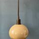 Vintage beige mushroom suspension in acrylic glass