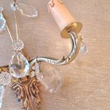 Gold wall light with tassel