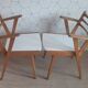 Pair of 1950s compass leg armchairs.