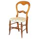 Victorian walnut dressing table chair from around 1880 with a medallion on the backrest.