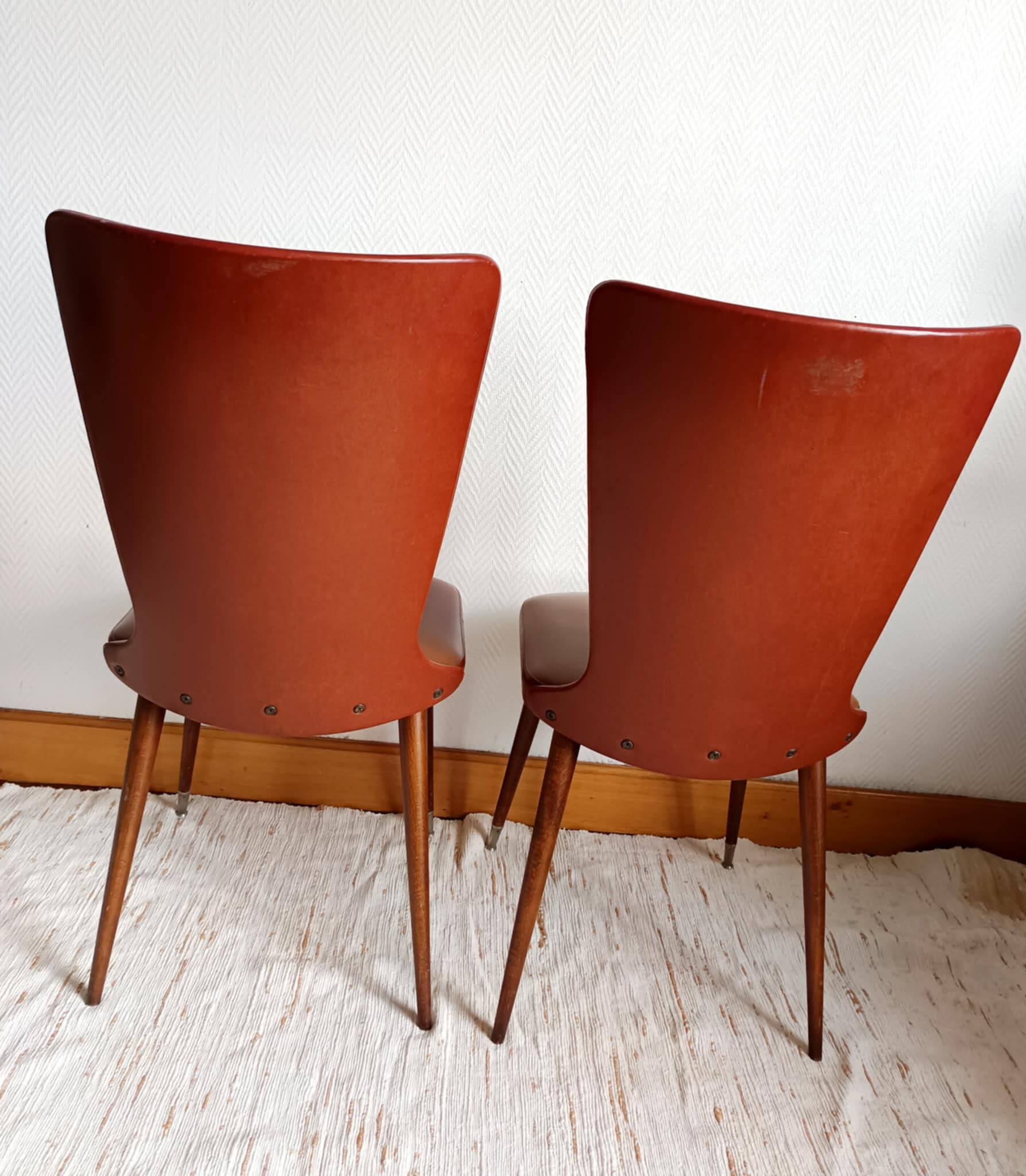 Pair of vintage vinyl chairs with splayed legs