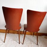 Pair of vintage vinyl chairs with splayed legs