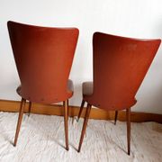 Pair of vintage vinyl chairs with splayed legs