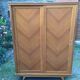 Vintage wardrobe with compass feet in oak and oak cp with 2 sliding doors.