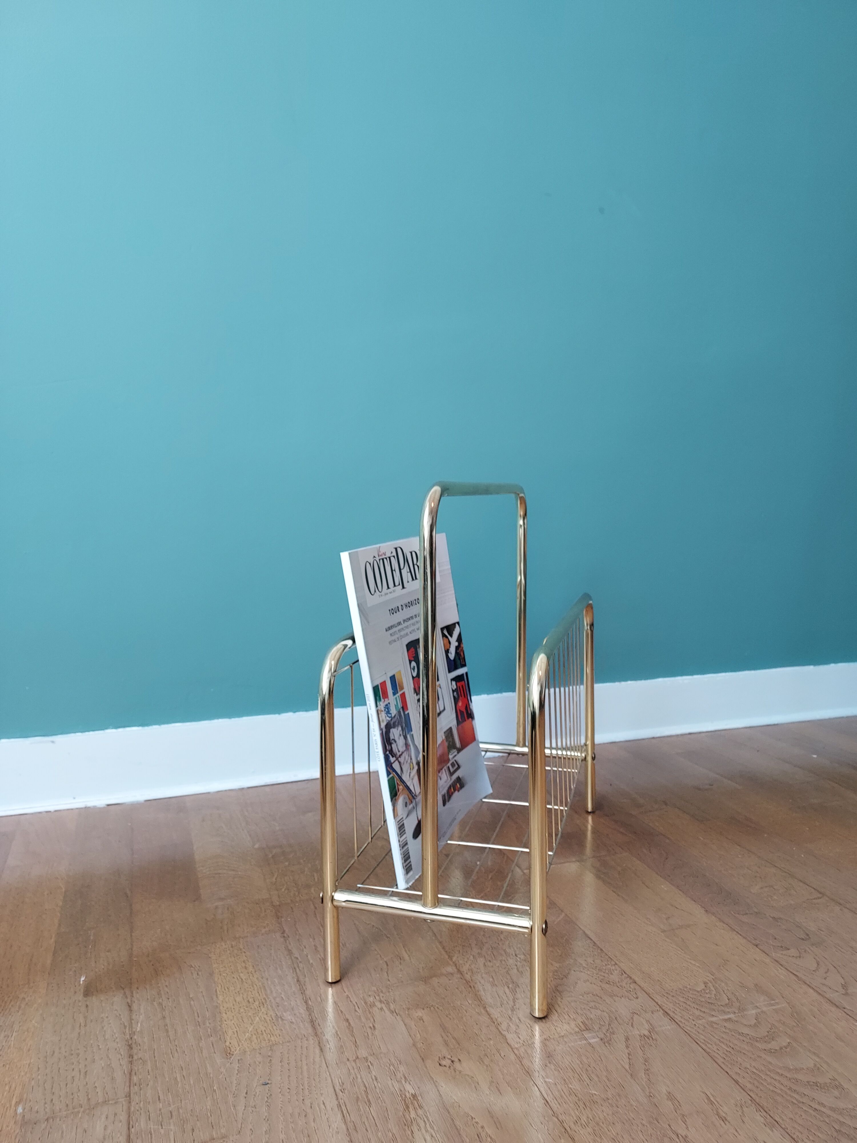 Gilded metal magazine door