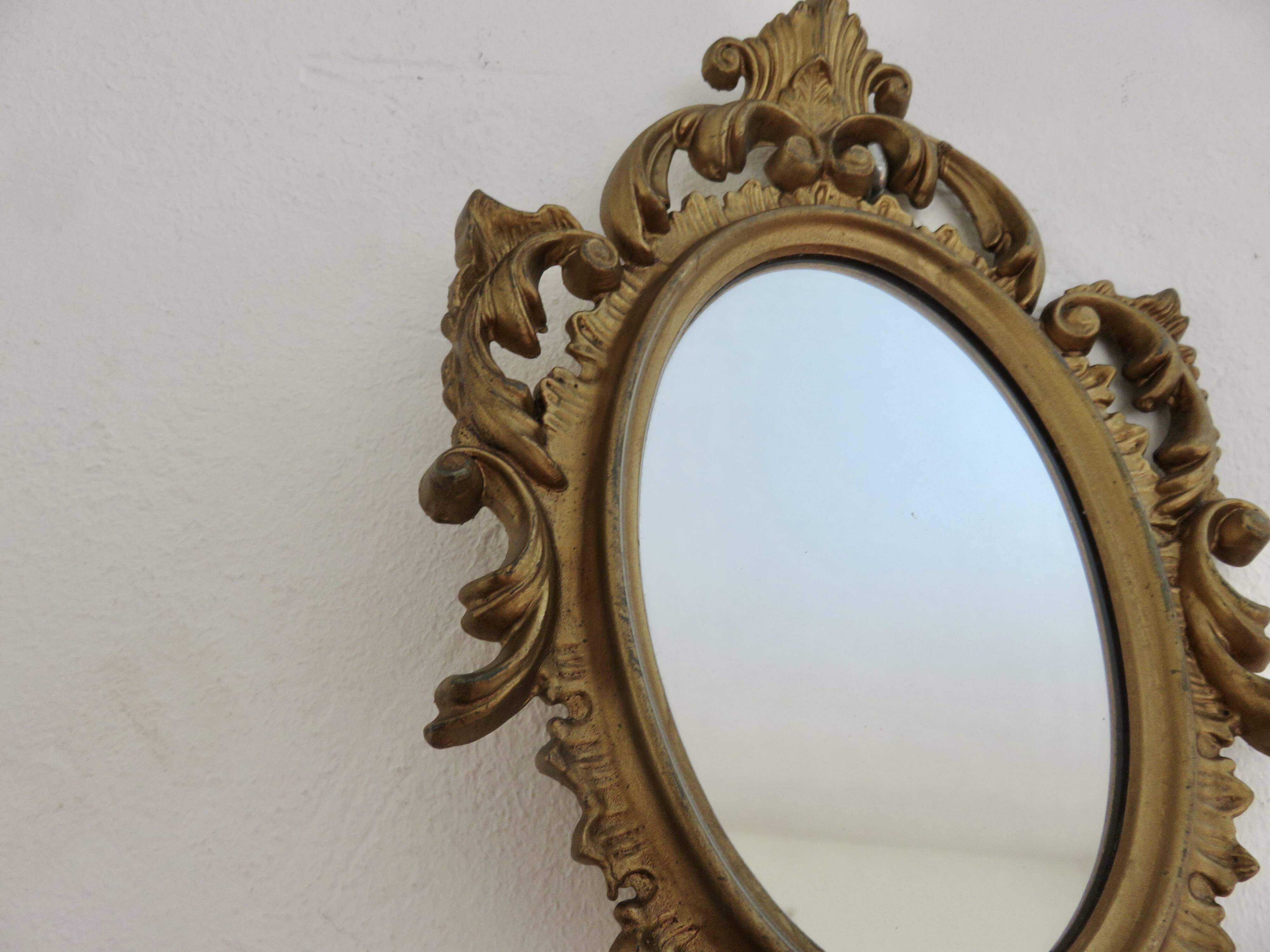 Small baroque mirror in gilded resin, made in Italy, 1970