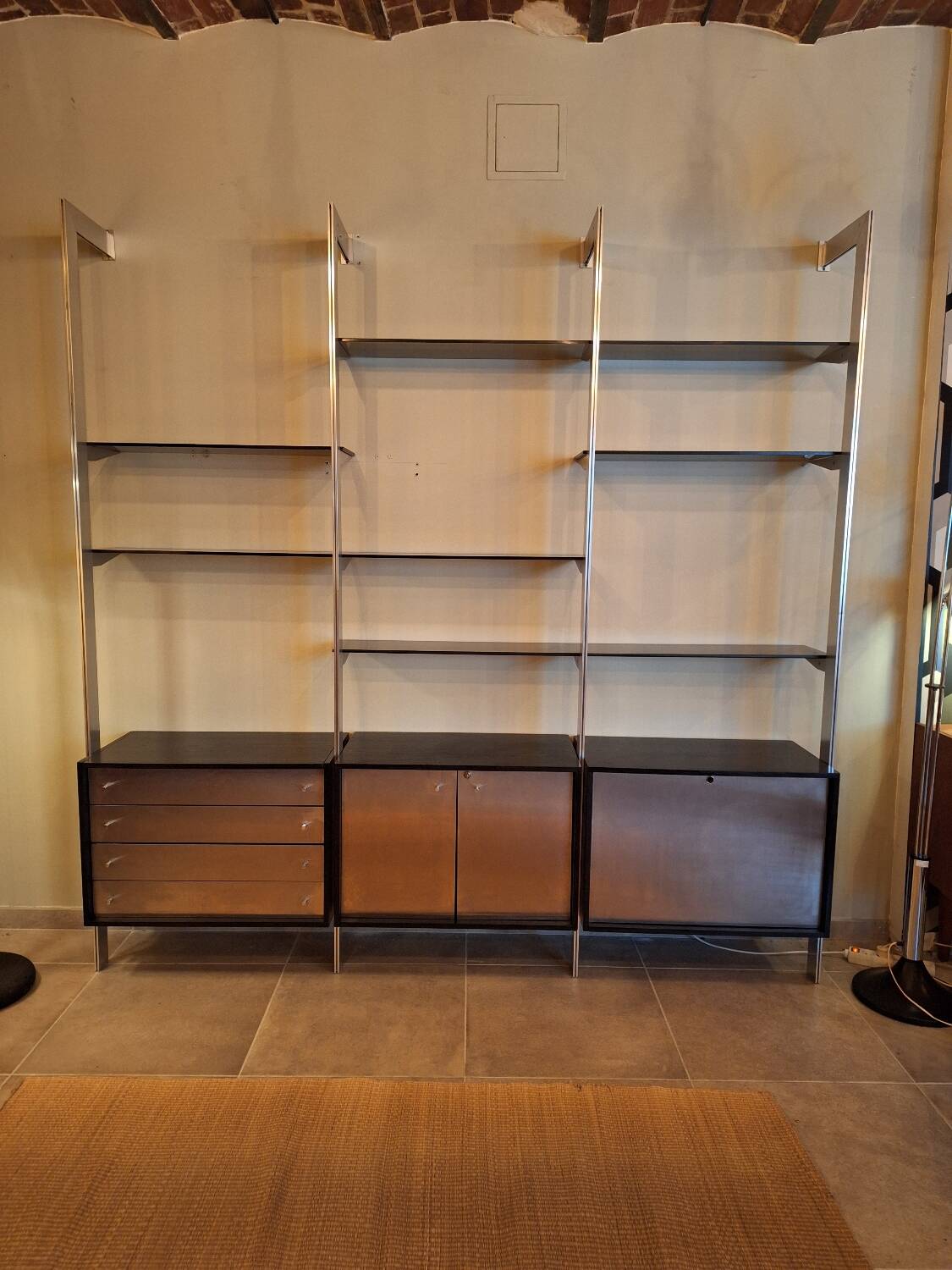 Wall shelves in wood, stainless steel and glass Roche Bobois