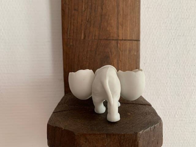 Small elephant in biscuit porcelain, 19th century salt cellars