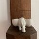 Small elephant in biscuit porcelain, 19th century salt cellars