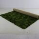 Beau tapis vert mélangé