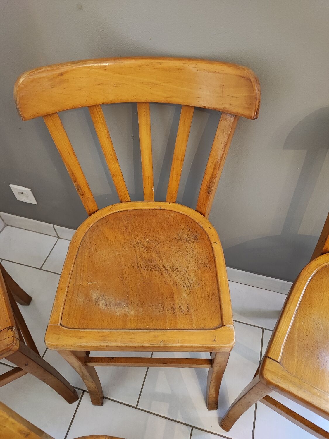 Vintage four-quarter bistro chairs