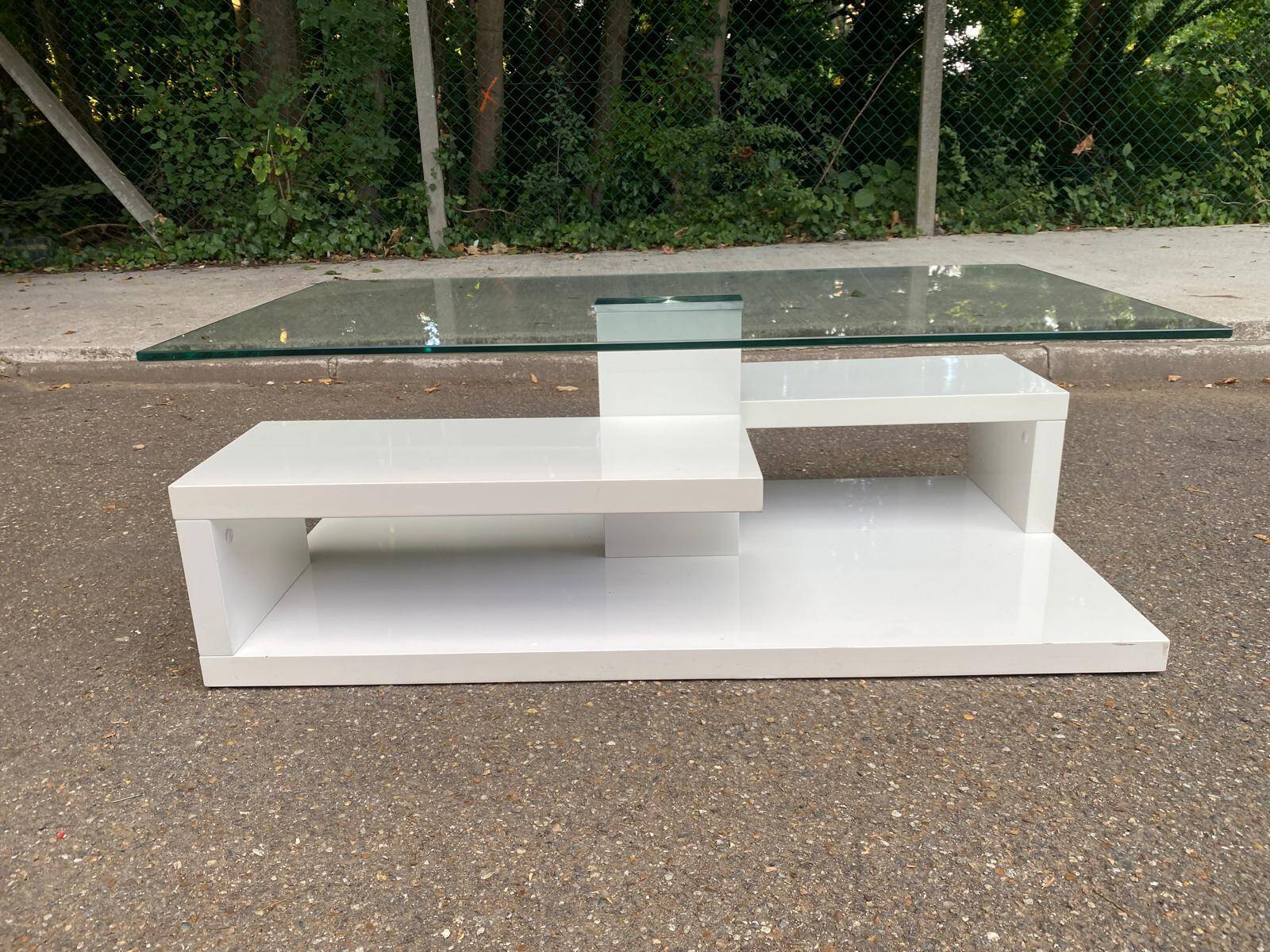 Glass and white lacquered coffee table