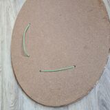 Oval mirror beveled gilded, wooden frame and stucco