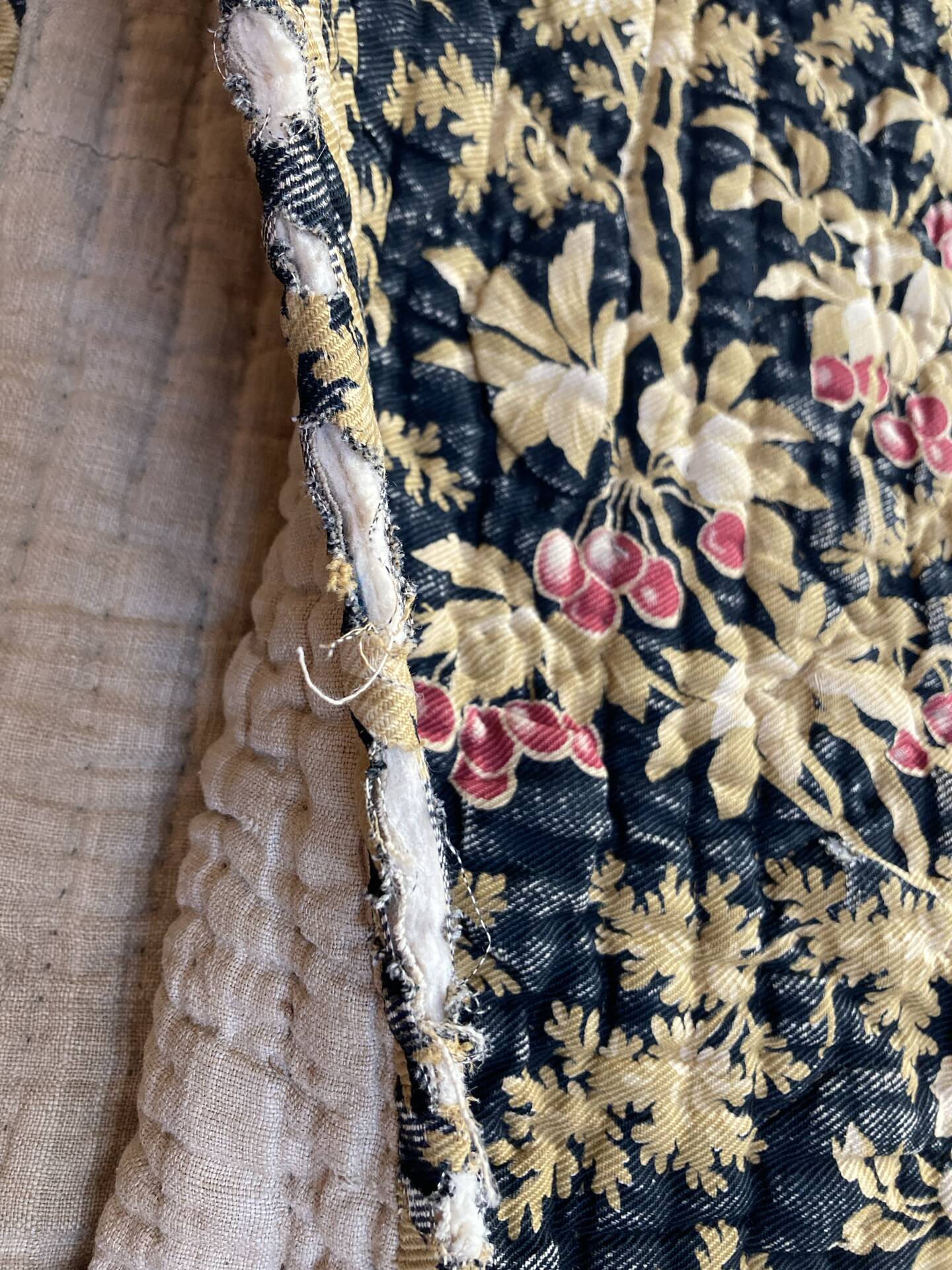 Antique hand-stitched boutis bedspread, floral fabric, 19th century.