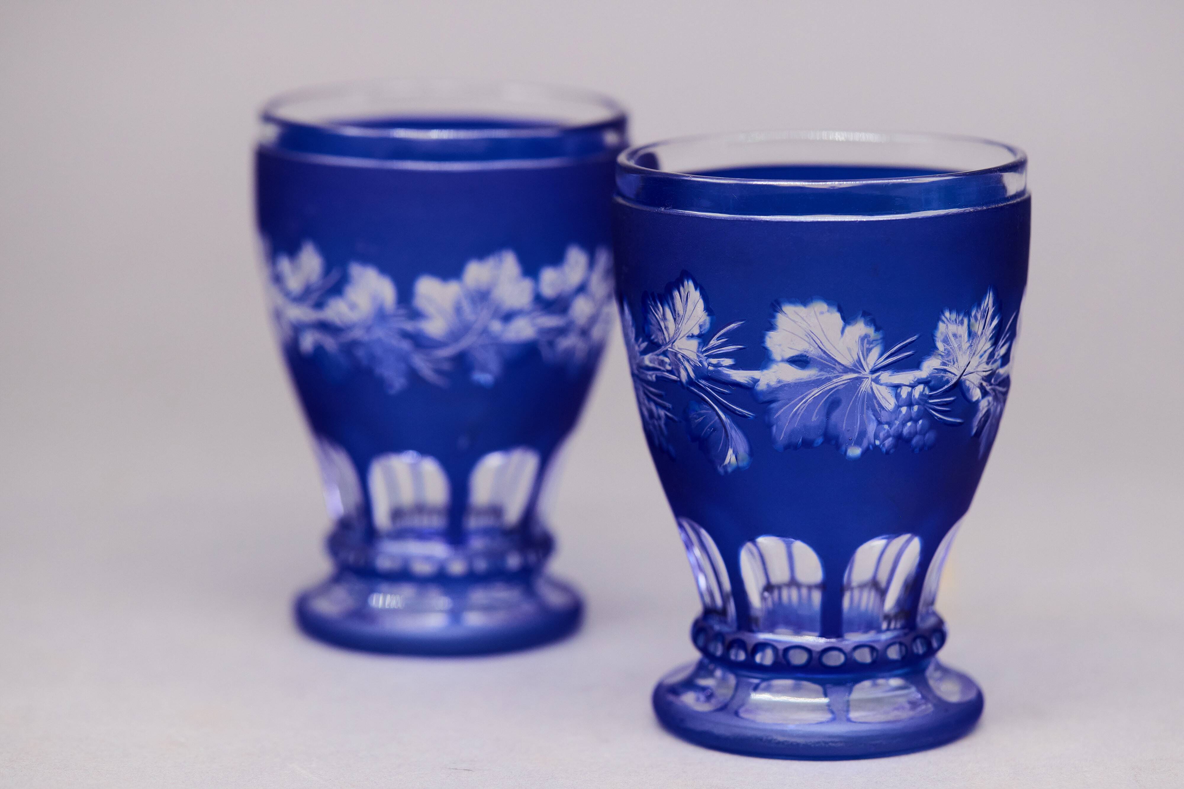 Pair of cut cobalt blue Bohemian crystal glasses on stems — Circa 1900