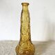 Bouteille, vase en verre ambré anges