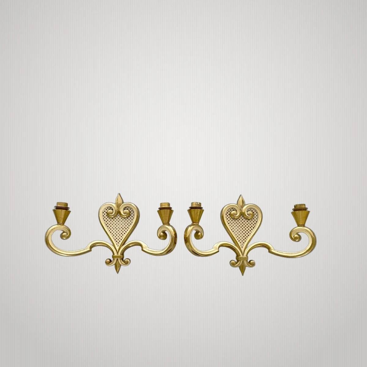 Pair of wall lights from the 1950s by Maison Arlus.