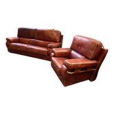 living room in patinated leather and brass from the 80s
