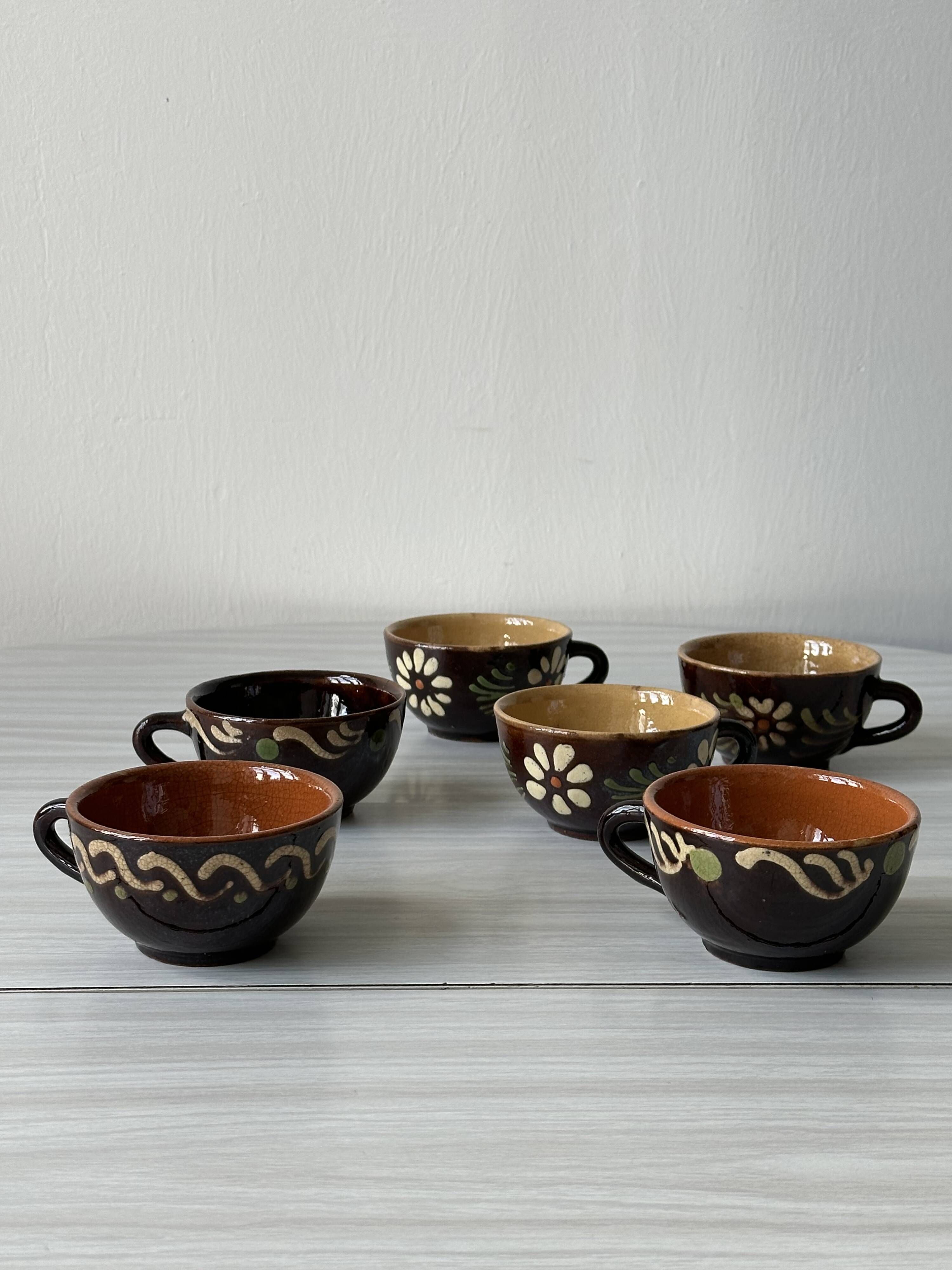 Lot of mismatched Alsatian pottery coffee cups