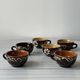 Lot of mismatched Alsatian pottery coffee cups