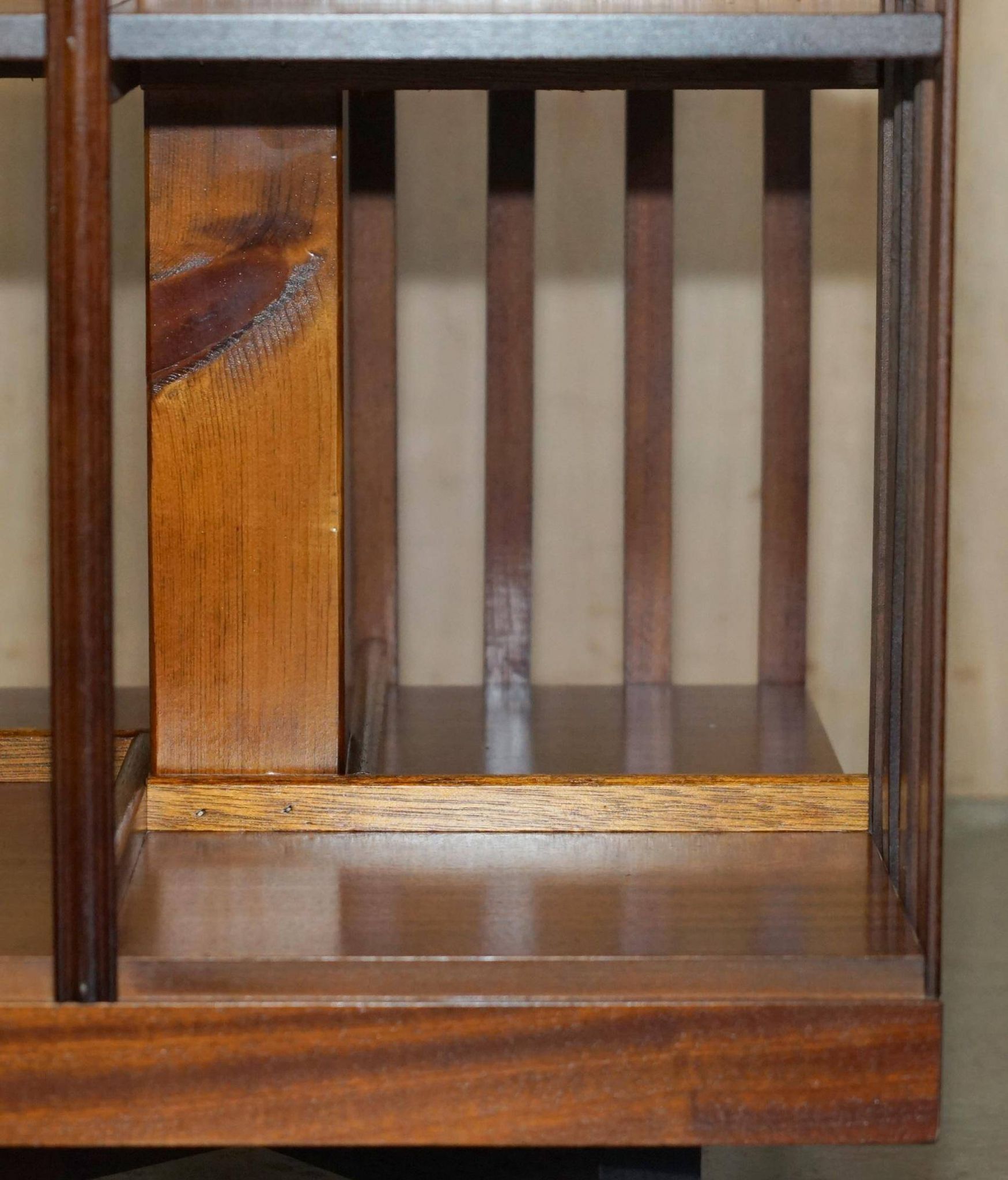 Sheraton Revival rotating library table in walnut and satin wood.