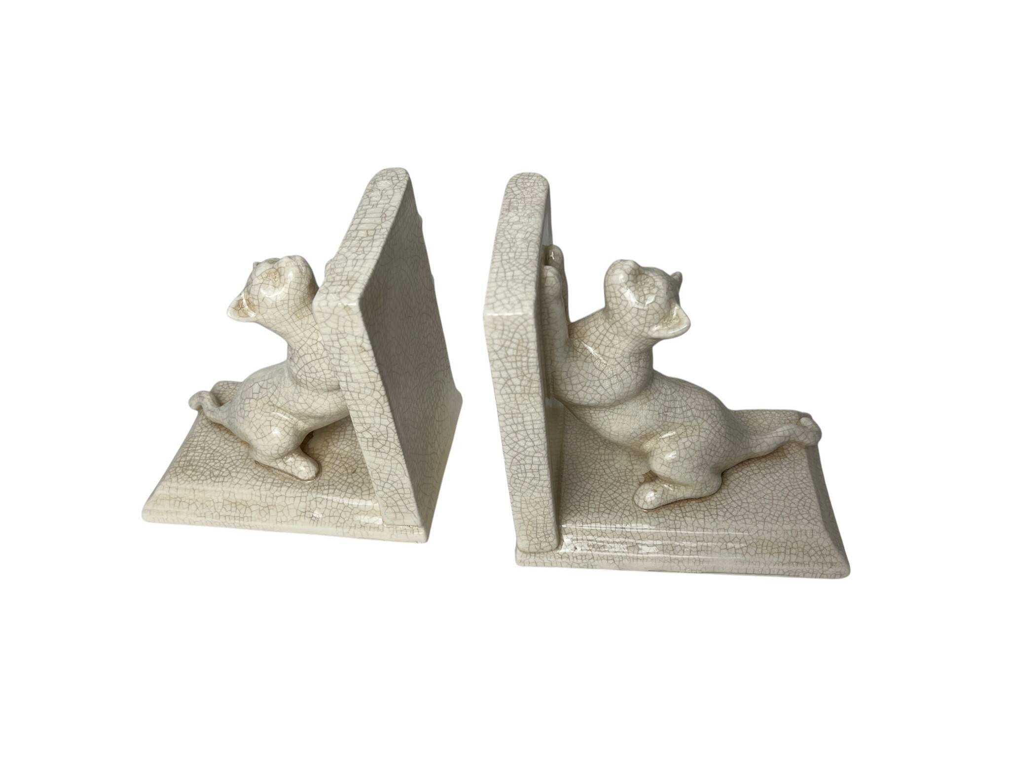 Art Deco, pair of crackled earthenware bookends featuring cats from Louvière around 1930.