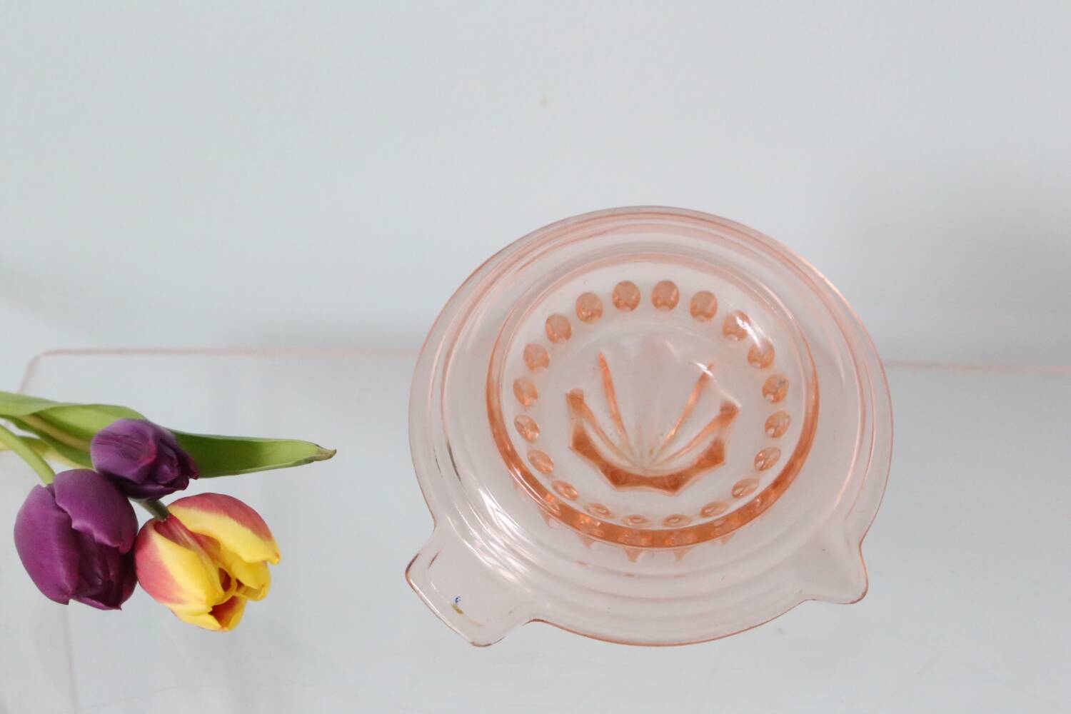 Adorable pink glass juicer