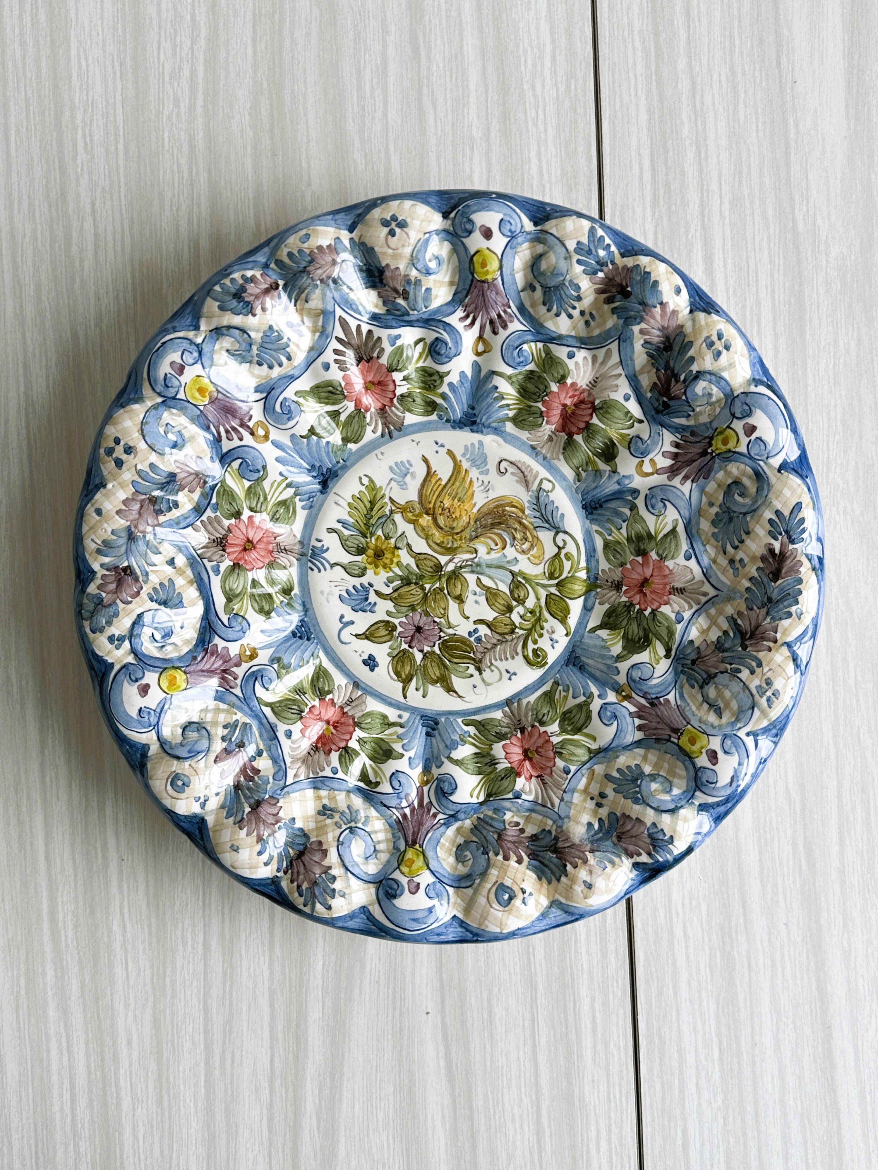 Large decorative dish hand painted with floral and bird motifs