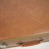 Cardboard and brown leather case