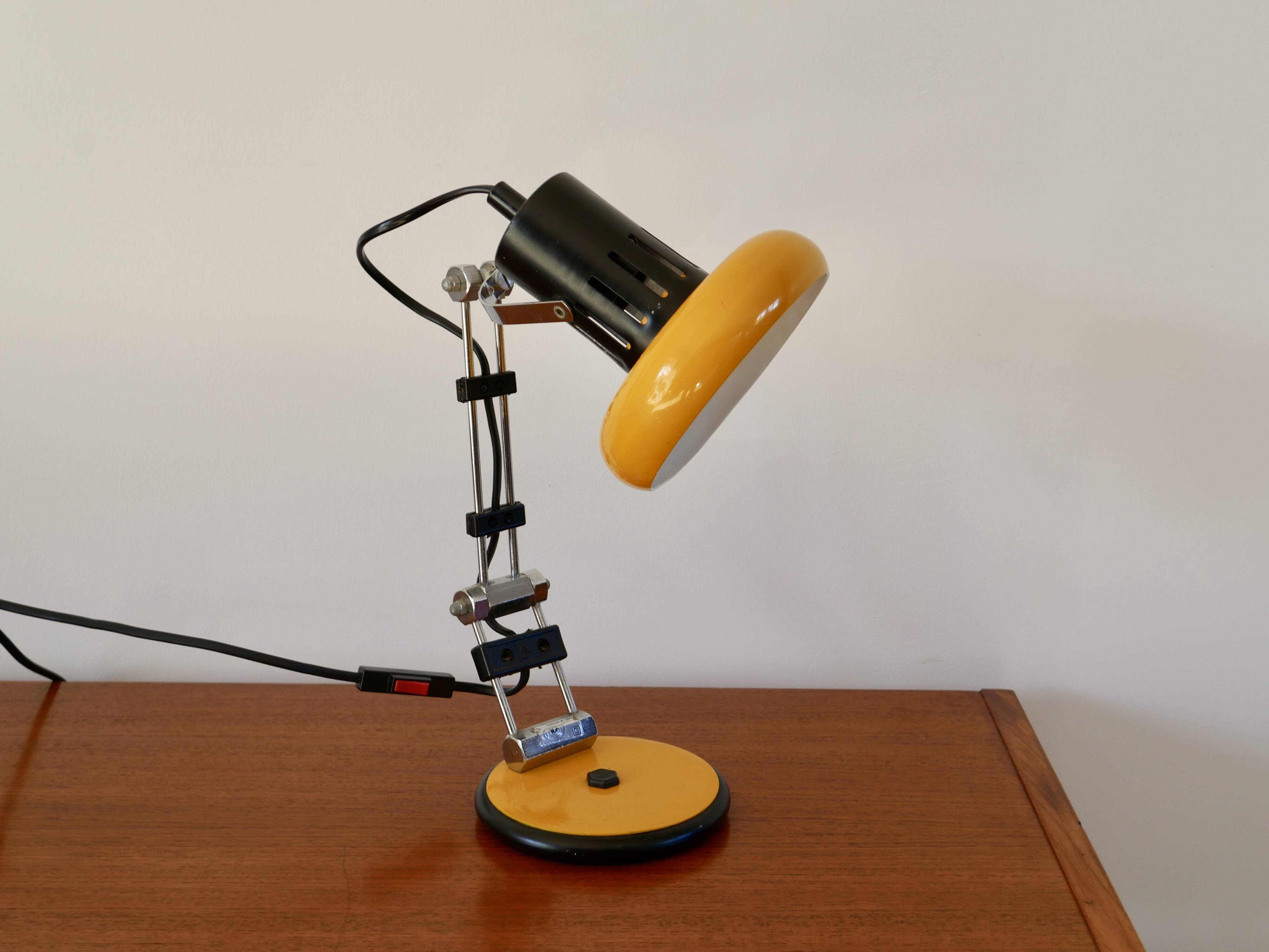 Articulated orange Aluminor desk lamp industrial design 70s