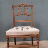 Chaise basse tapissée