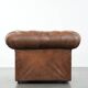 Brown cowhide leather chesterfield armchair  in English style on wheels