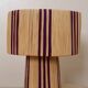 Table lamp in natural raffia with purple stripes
